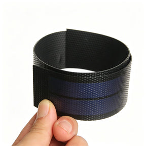 Long narrow ETFE solar strip held in a curve
