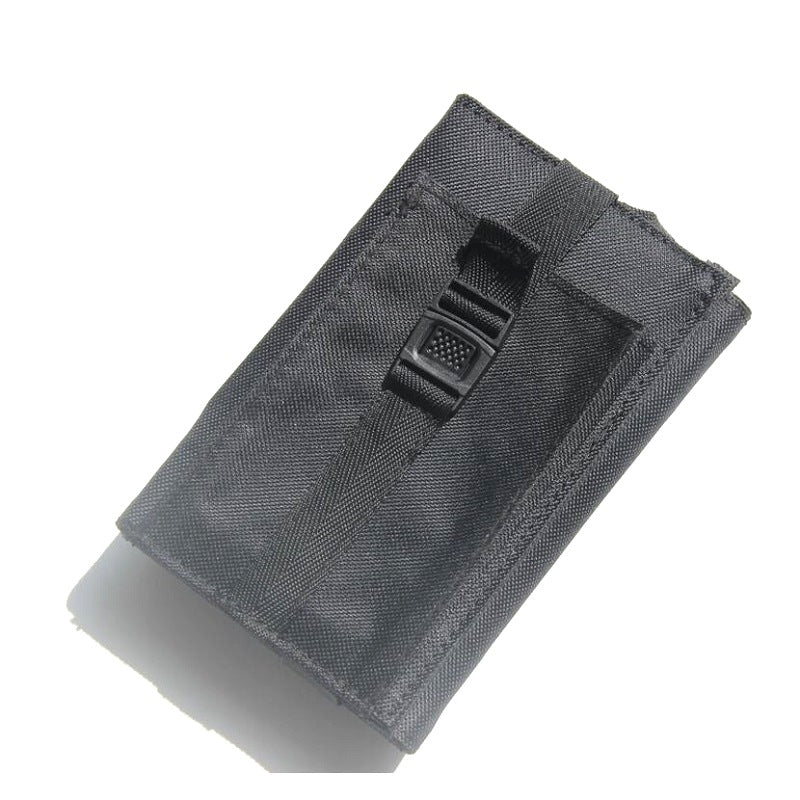 Black charger folded and secured with a buckle