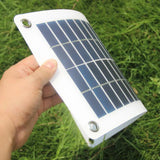 Semi-flexible white-backed panel held gently curved