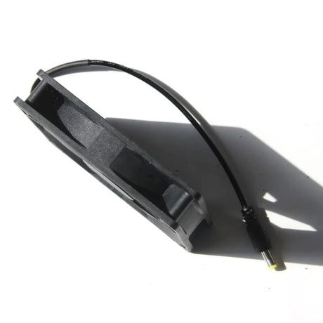 DC plug between solar panel and fan assembly