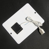 White rear surface with cable housing and USB socket