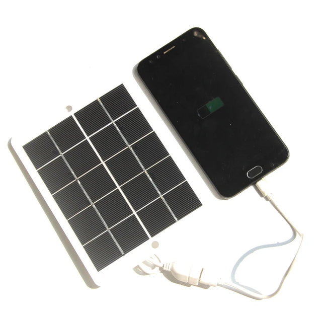 White solar panel and phone connection example; phone not included