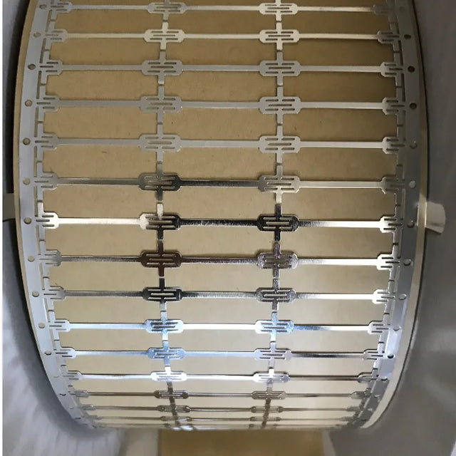 Rouleau de bandes de connexion dog bone pour cellule photovoltaïque IBC