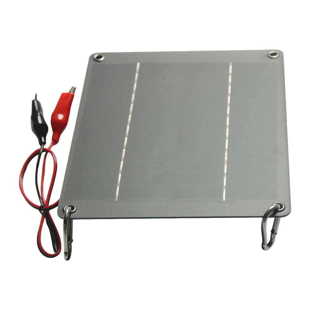 12V mini solar panel with carabiners fitted through mounting holes