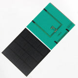 2W 6V Mini Solar Panel, 115 × 115mm PET Module - Front and rear panel views with terminal markings