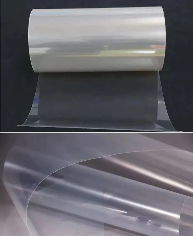 PET solar panel backsheet roll partly unrolled on a dark background