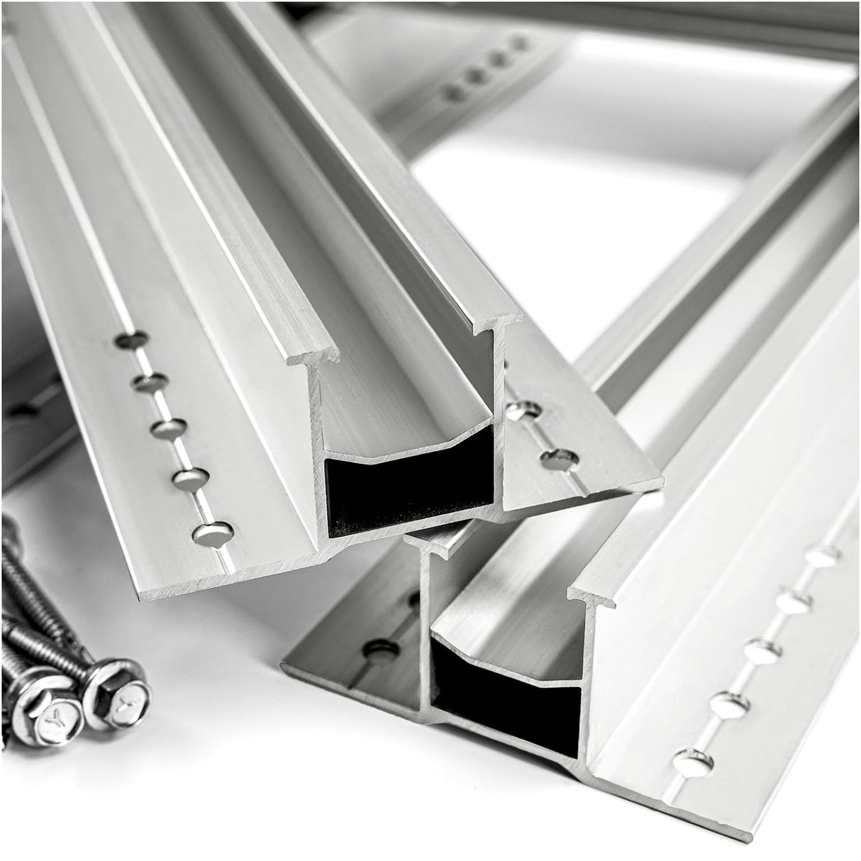 Close-up of rail profiles and fasteners highlighting material finish.