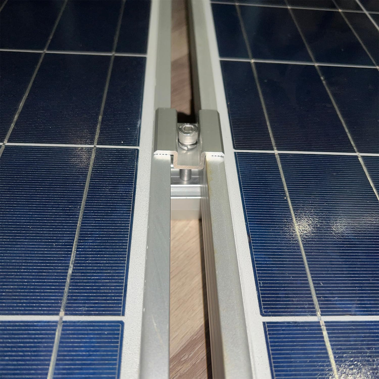Four-panel layout using silver solar mounting brackets and mini rails