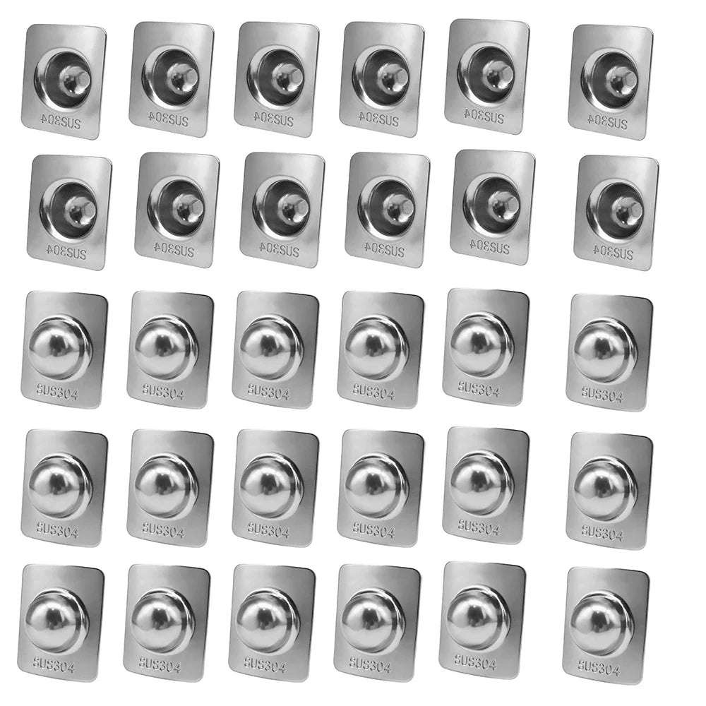 Thirty stainless steel dome bolt caps arranged on a white background