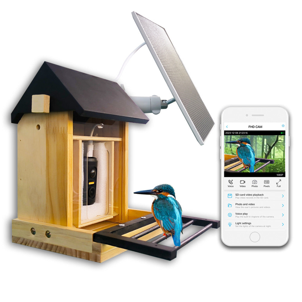 Wooden bird feeder with solar panel and phone displaying the camera view